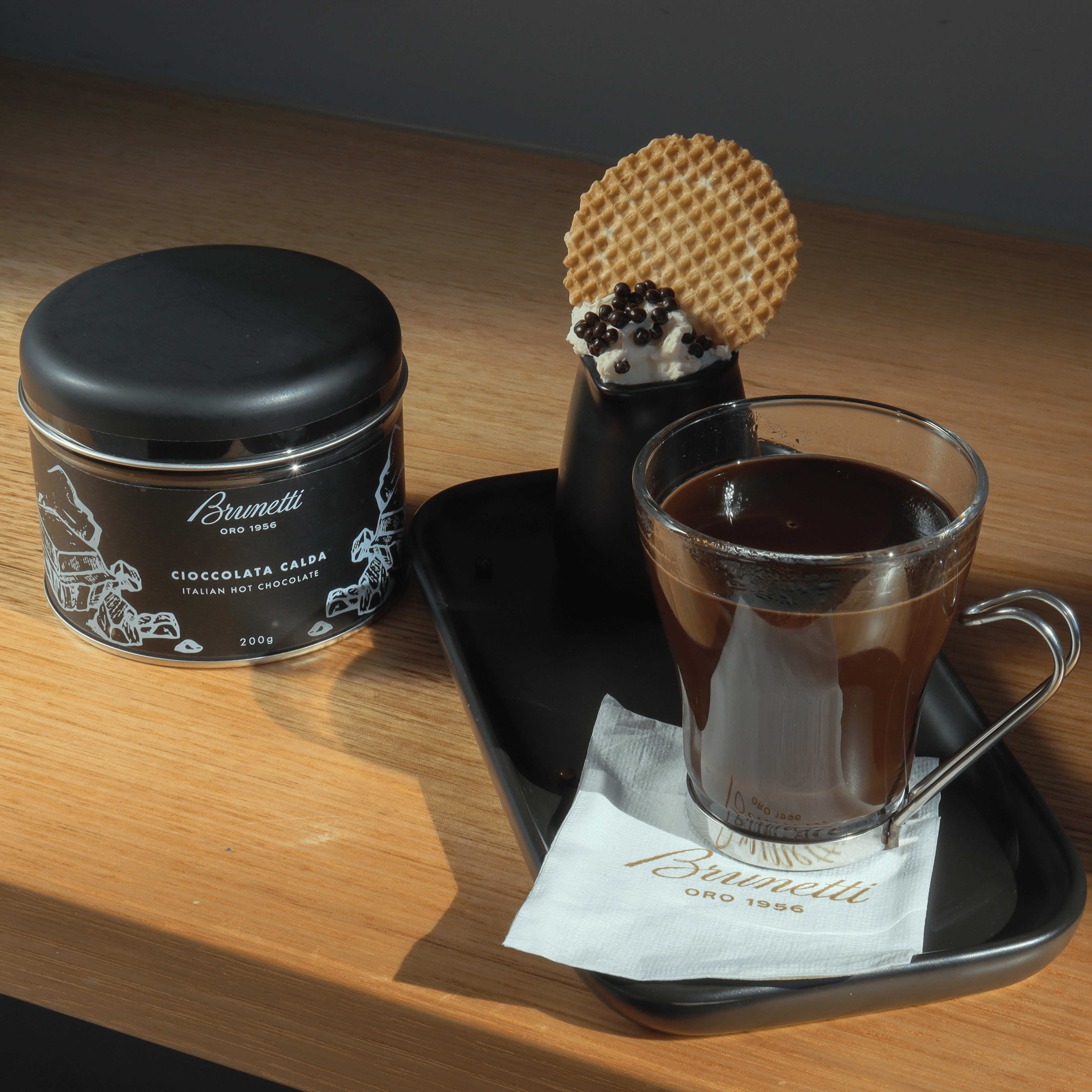 A cup of Cioccolata Calda (Italian Hot Chocolate) on a tray.