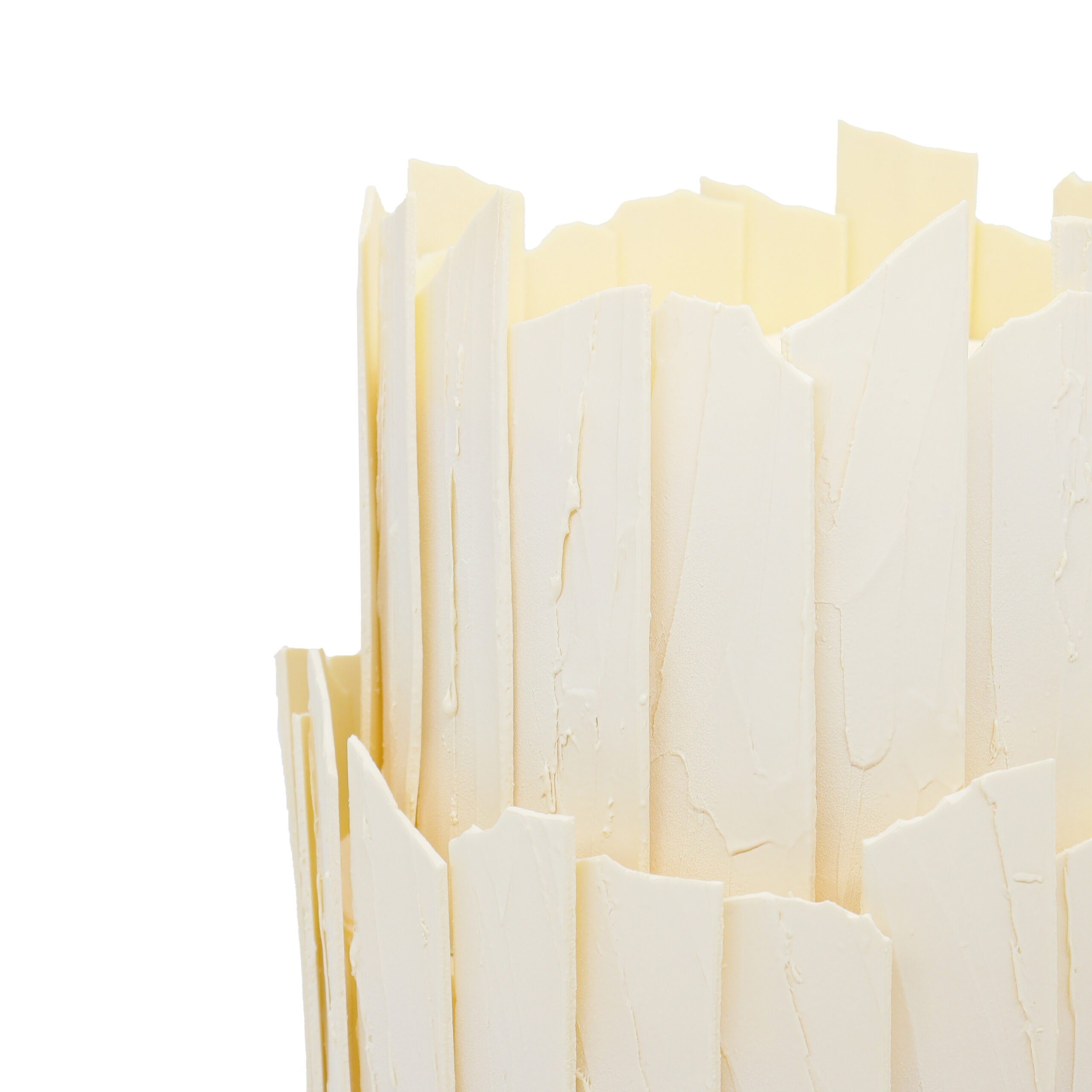 An image of a white cake on a white background.
