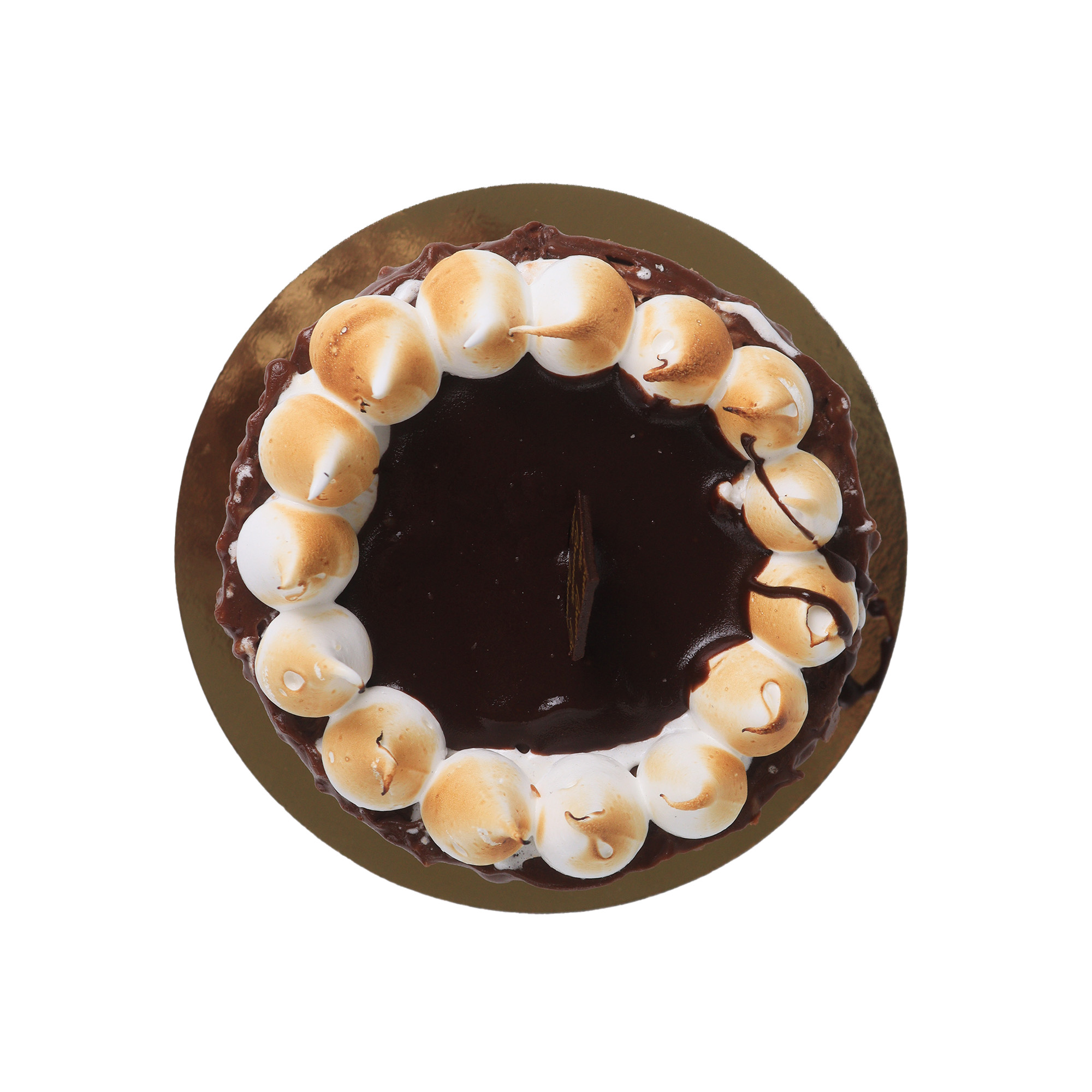 Top view of a chocolate cake topped with a ring of toasted marshmallows on a golden plate, isolated on white background.